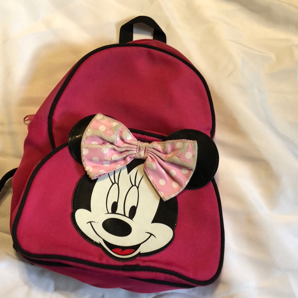 TLC needed on bow Minnie Mouse mini bckpk